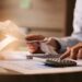 Business Accountant Using Calculator