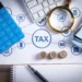 The UK's tax policy, reaching historic levels due to heightened government spending and demographic pressures.